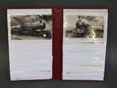 A postcard album containing approximately 80 steam railway locomotive postcards including Southern,