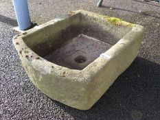 A small D end natural stone trough,