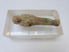 An Egyptian Shabti on perspex block