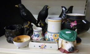 A collection of ceramics including Poole pottery vases, retro blackbird jardinieres,