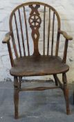 A hoop back Windsor armchair and a stick stand