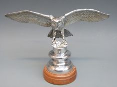 An owl car mascot with outstretched wings, marked H.Jenks Ltd, London, height including base 12.