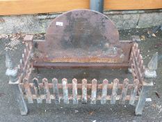 A cast iron fire grate,