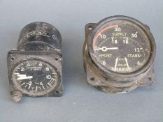 A Dunlop aircraft brake gauge marked ACO 9719 and an acceleration gauge marked mod inst A / 278