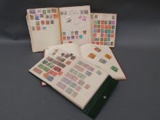 A themic collection of sports stamps and three other albums of world stamps