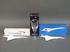 A quantity of Concorde collectables comprising two models and glass