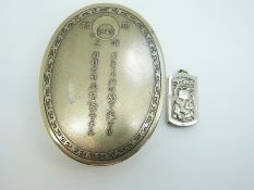 A Chinese silver vesta case with embossed prunus decoration to one side, verso figural decoration,