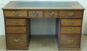 A late 19thC / 20thC twin pedestal leather inset mahogany desk,