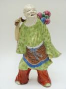 A 19thC Chinese figure of an immortal