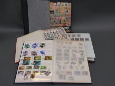 Three stockbooks of Russian stamps and two stockbooks of Japanese stamps including early issues