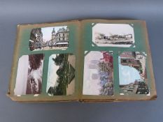 An Edwardian postcard album with virtually all cards addressed to Mrs Adams, Gloucester c1906,