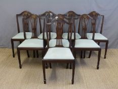 Set of eight upholstered dining chairs