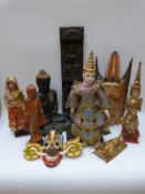 A collection of Thai and Indonesian items to include carved wood Buddhas, temple figure,