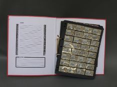 A stockbook of stamps from Ceylon and Nyasaland,