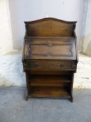 An oak Art Nouveau style student's bureau,