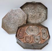 An Indian copper octagonal betel nut box with embossed floral decoration