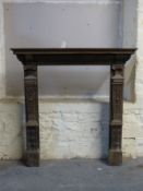 A carved oak fireplace by repute originally from Cheney Walk, the house designed by C R Ashbee,