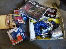 A quantity of tools including air impact wrench, airbrushes,