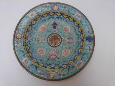 A 19thC Chinese copper on enamel dish decorated with flowers on aqua ground,