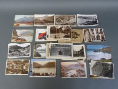 A collection of postcards including Pitlochry novelty card with Highland Terrier,