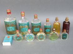 A quantity of vintage advertising Eau De Cologne bottles and two sealed bottles of perfume