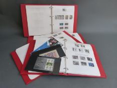 Four albums of GB commemorative stamps