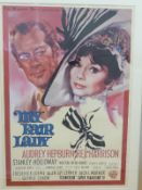 A Warner Brothers My Fair Lady film poster featuring Audrey Hepburn and Rex Harrison,
