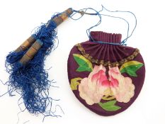 A 19thC embroidered Chinese purse with floral decoration and drawstring top