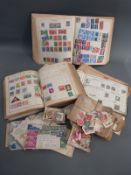 Three albums of all-world stamps with many early issues together with loose stamps and envelopes