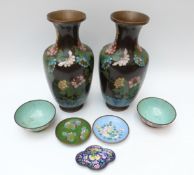 A pair of Chinese cloisonné vases, two Chinese enamel tea bowls,