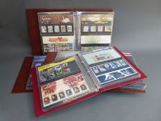 Approximately 230 GB presentation packs in four albums, mainly 1990-2010.