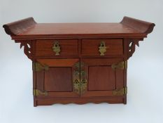 A Chinese elm jewellery chest,