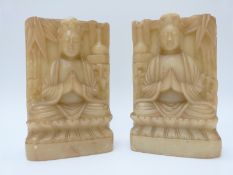 A pair of soapstone carvings of Guanyin, 17.