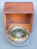 A boxed ship's gimbal compass,