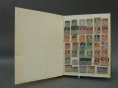 A stock album of stamps from the USA, from early issues,