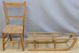 A small vintage sled and child's chair