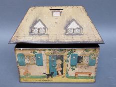 The Lucie Attwell 'Kiddibics' biscuit tin and moneybox, H18cm,