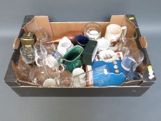 A collection of whisky advertising jugs and glasses etc