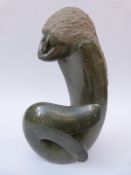 An African Shona green stone carving of a stylised mermaid, signed Wonder Chiwaridzo, dated 2002,