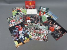 A collection of colour photographs of Manchester United players celebrating their win against