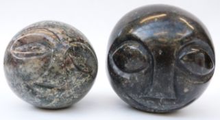 Two African Shona stone carvings of stylised heads, both signed Noel Mwanza,