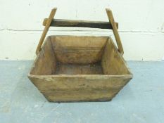 A Chinese wooden water carrier