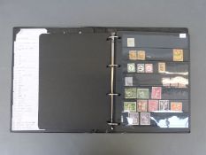 A ring binder of Commonwealth stamps including early Canada