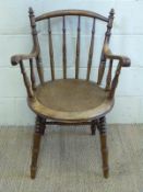 A vintage spindle back office chair