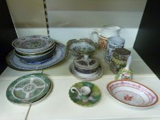 A collection of oriental ceramics including bowl, dishes, vases, a hand bell, pots etc.