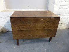 An 18thC/19thC elm topped drop leaf table, W99 x min L53,