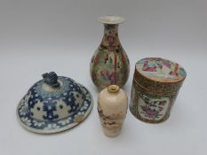 A Chinese famille rose lidded pot and baluster vase,