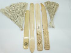 An early 20thC Japanese ivory page turner with carved floral decoration, verso engraved signature,