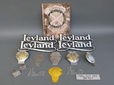 A quantity of commercial vehicle and other badges including AA, Leyland,