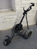 An electric golf trolley complete with battery